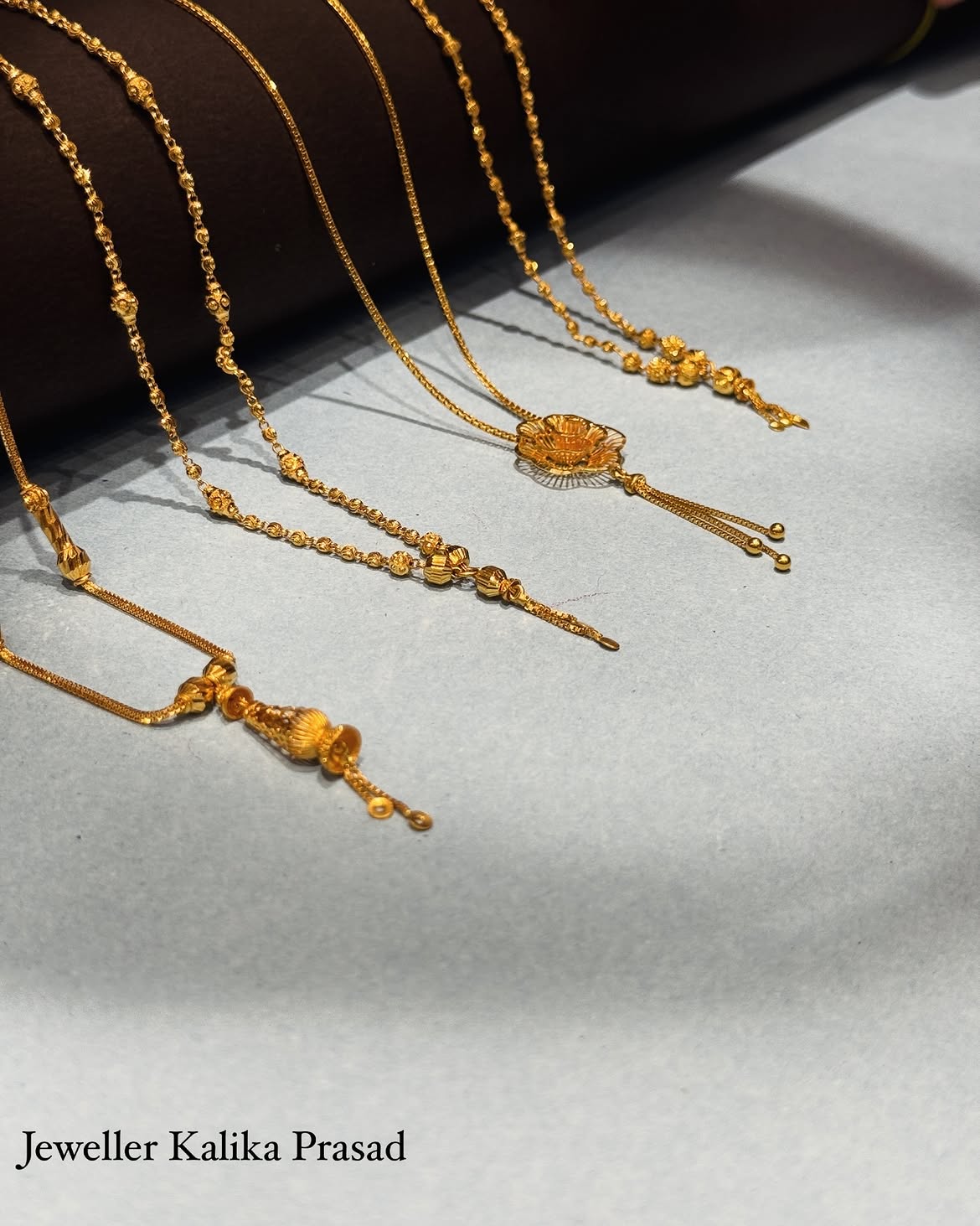 22 carat gold chains with pendants from Jeweller Kalika Prasad