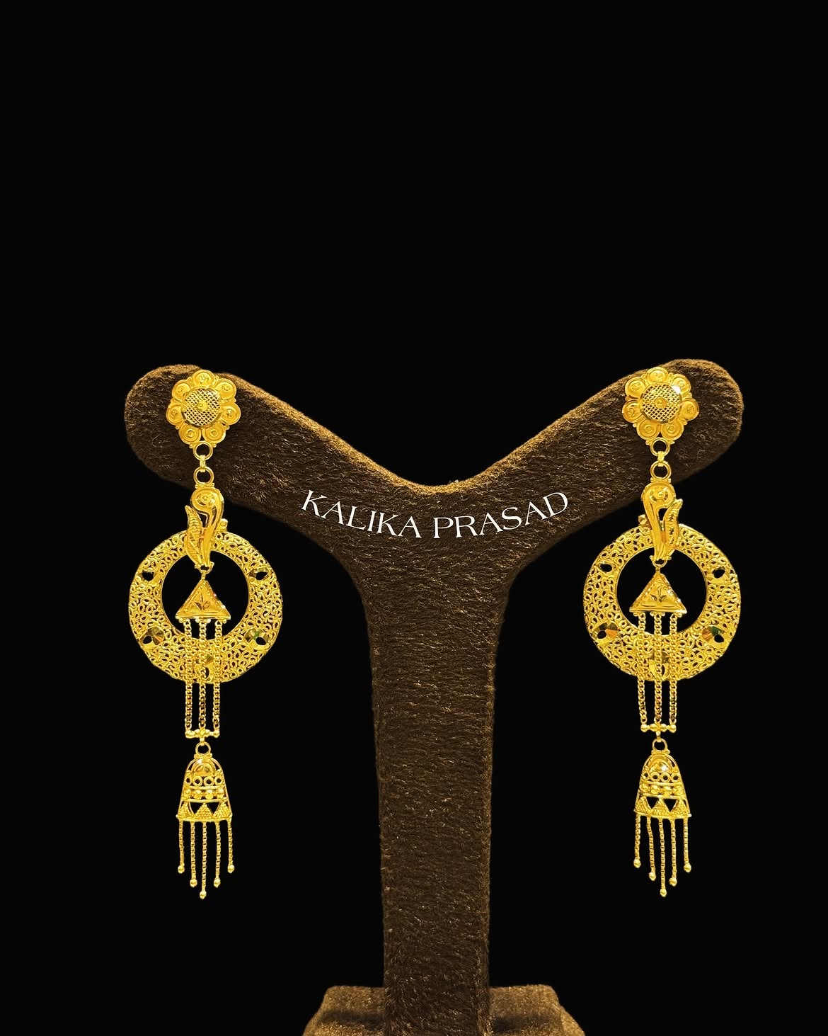 Gold chandbali earrings with jhumka drops